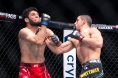 Robert Whittaker lands an uppercut on Ikram Aliskerov