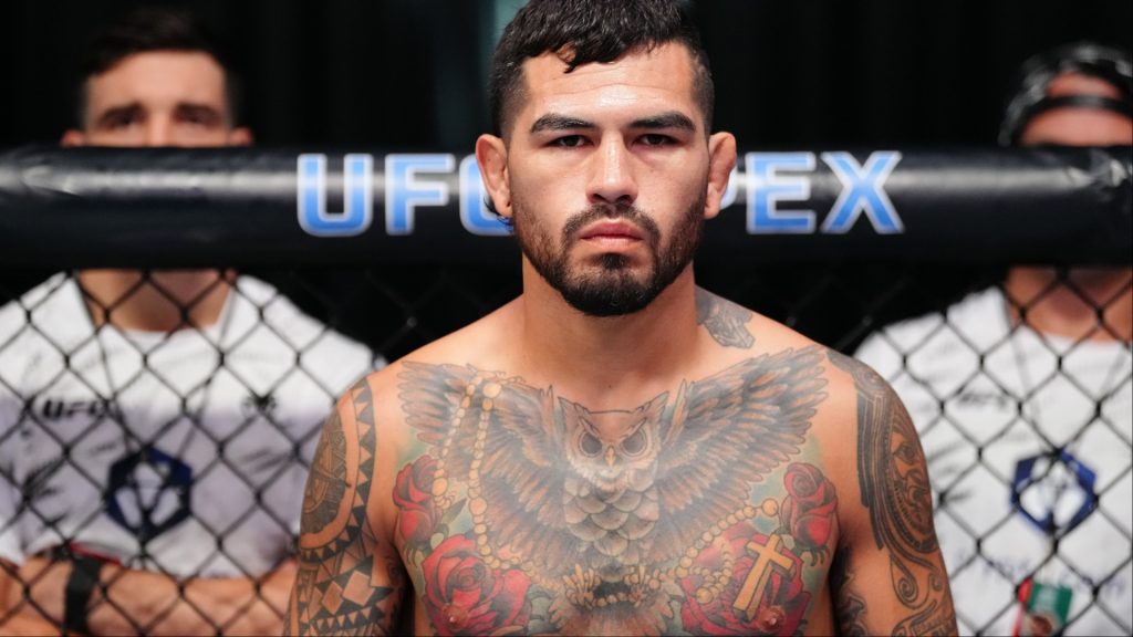 Anthony Hernandez stares down opponent Roman Dolidze in the Octagon