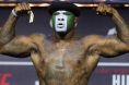 Mohammed Usman poses on the scale during the UFC Baku ceremonial weigh-in