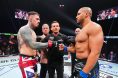 Tom Aspinall and Ciryl Gane fist bump at UFC 321