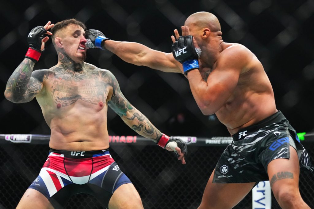 Tom Aspinall vs. Ciryl Gane ends in no contest at UFC 321