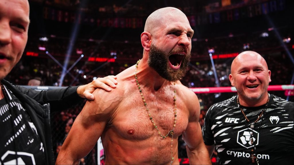 Jiri Prochazka celebrates his win with his team at UFC 320