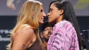 Kayla Harrison and Amanda Nunes face off at a UFC 324 press conference