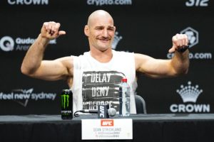 Sean Strickland entertains fans during UFC 312 presser