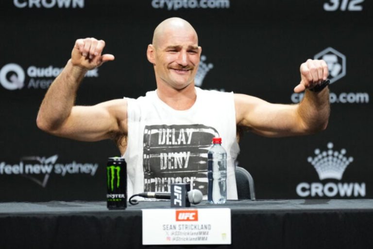 Sean Strickland entertains fans during UFC 312 presser