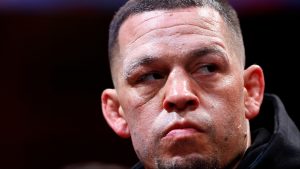 Nate Diaz enters the boxing ring for his fight against Jorge Masvidal
