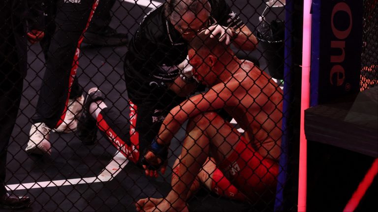 Nate Diaz gets medical treatment in the cage