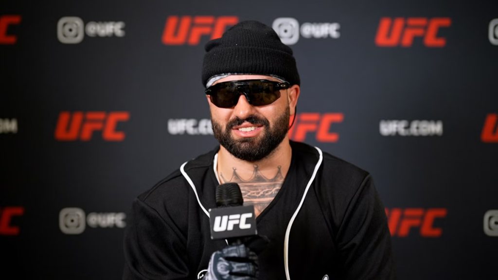 Josh Hokit takes questions during a UFC media day session