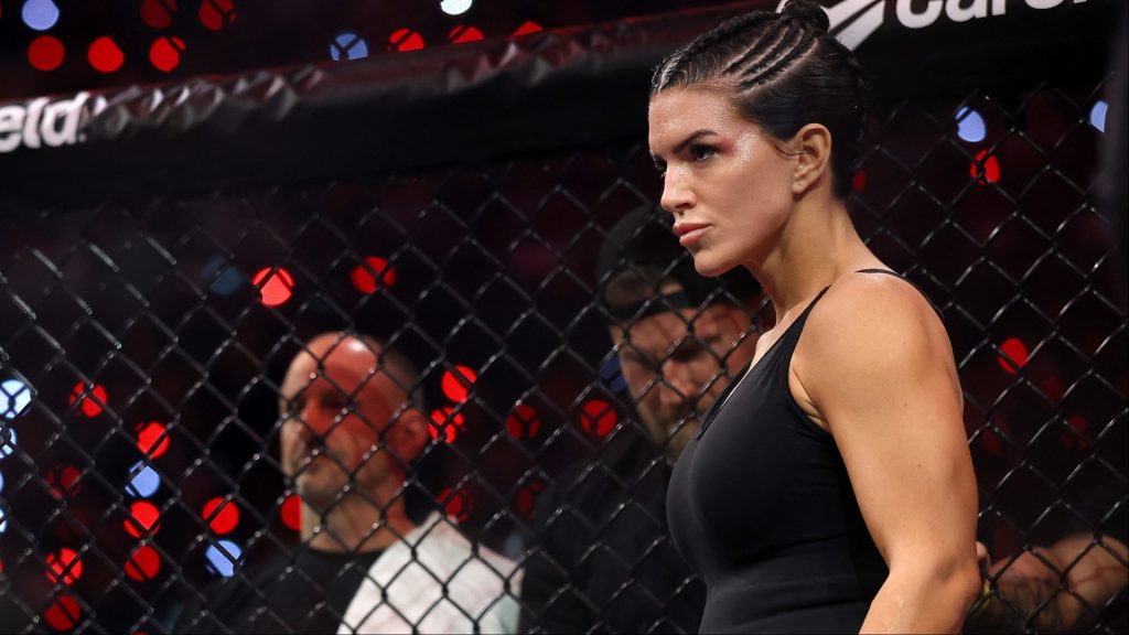 Gina Carano enters the cage for her fight against Ronda Rousey