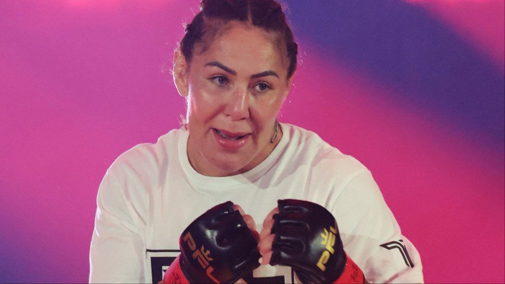 Cris 'Cyborg' Justino walks out for her fight against Larissa Pacheco