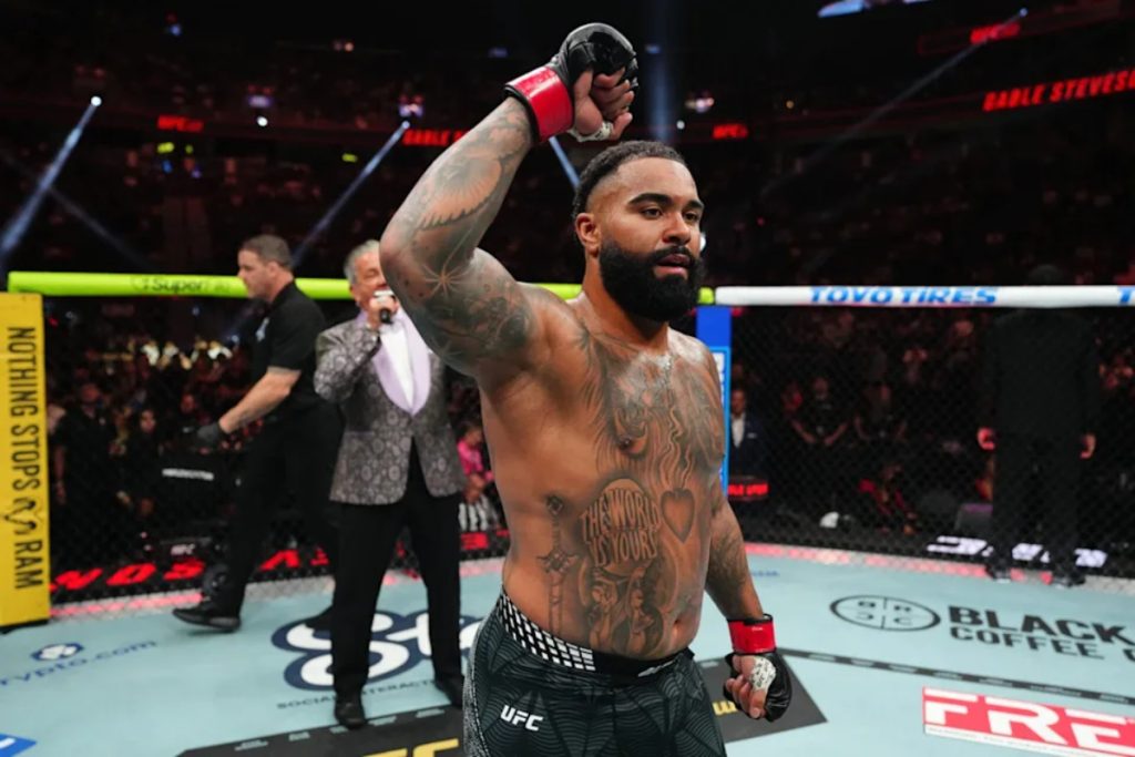 Gable Steveson celebrates after defeating Elisha Ellison at UFC 329
