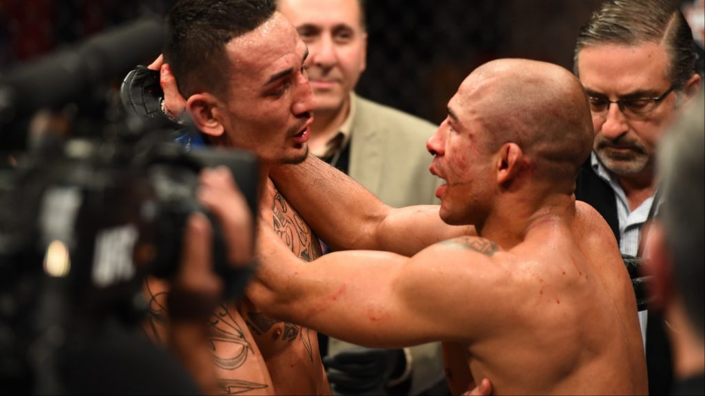 Max Holloway and Jose Aldo in the Octagon after UFC 218
