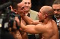 Max Holloway and Jose Aldo in the Octagon after UFC 218