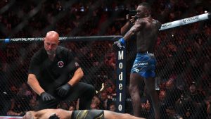 Israel Adesanya celebrates after knocking out Alex Pereira at UFC 287