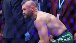 Conor McGregor reacts after his fight at UFC 329