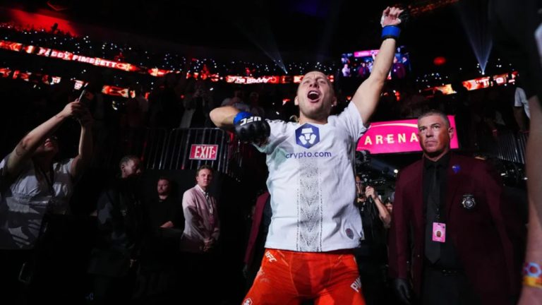Paddy Pimblett dances during his UFC 329 walkout prior to choking out Benoit Saint Denis